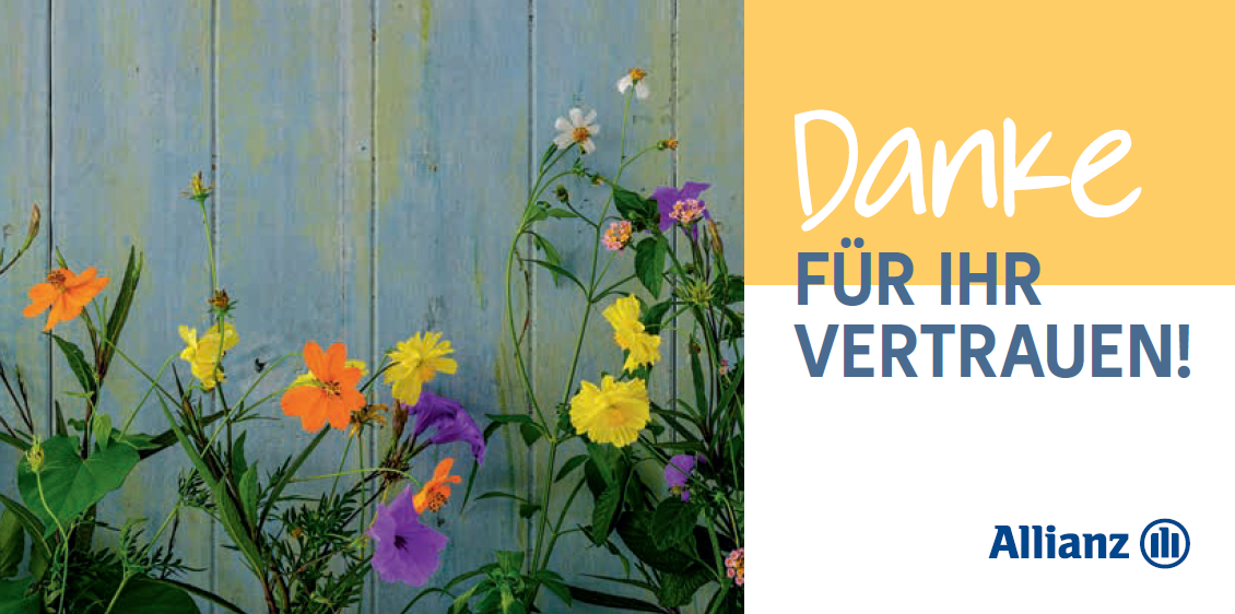Dankeskarte mit bunten Blumen vor Holzwand Dankeskarte mit bunten Blumen vor Holzwand